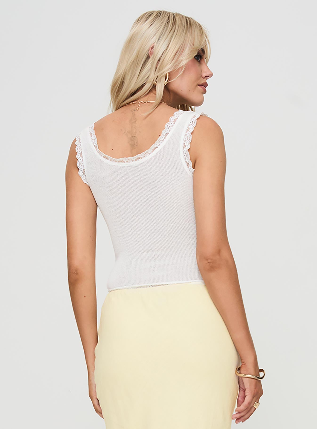 back view of model wearing Princess Polly Julien Top White Sleeveless V-Neck 