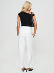 back view of model wearing Princess Polly Jazzar Pocket Detail Pleated Pant White High Waisted Pants 