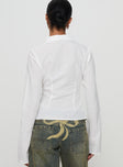 back view of model wearing Princess Polly Foxley Long Sleeve Top White Full Sleeves V-Neck 