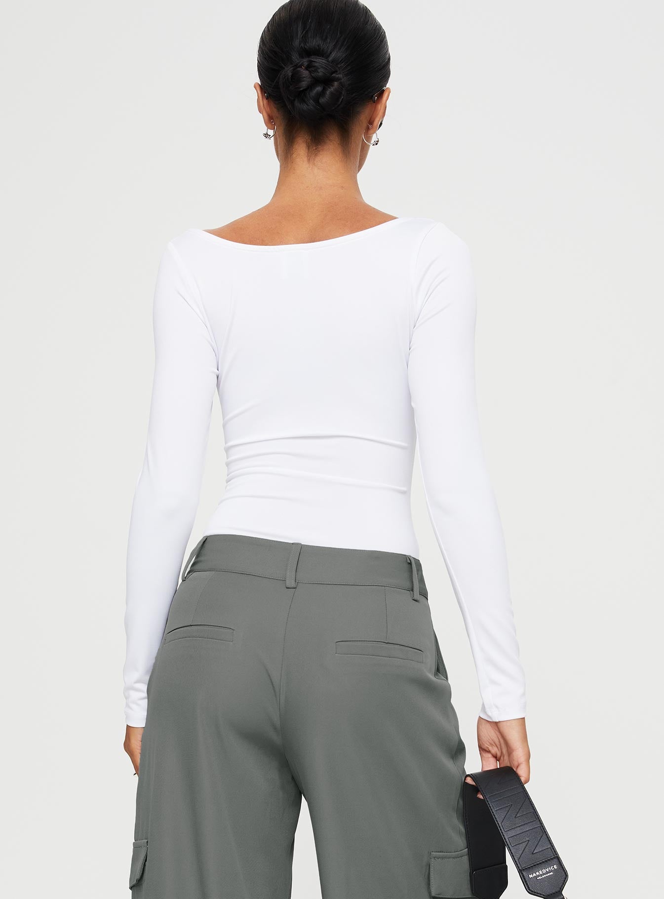 back view of model wearing Princess Polly Ellery Bodysuit White Full Sleeves Square Neck 