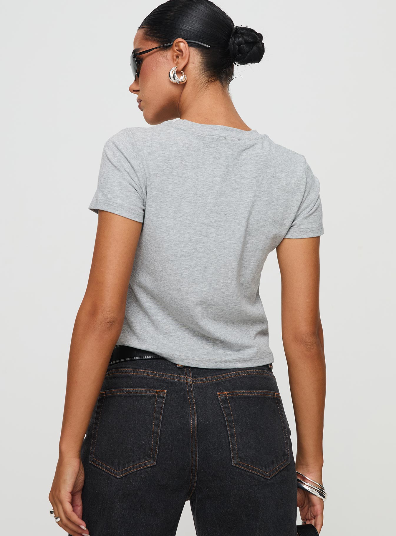 back view of model wearing Princess Polly Alonza Tee Grey Short Sleeves Crew Neck 
