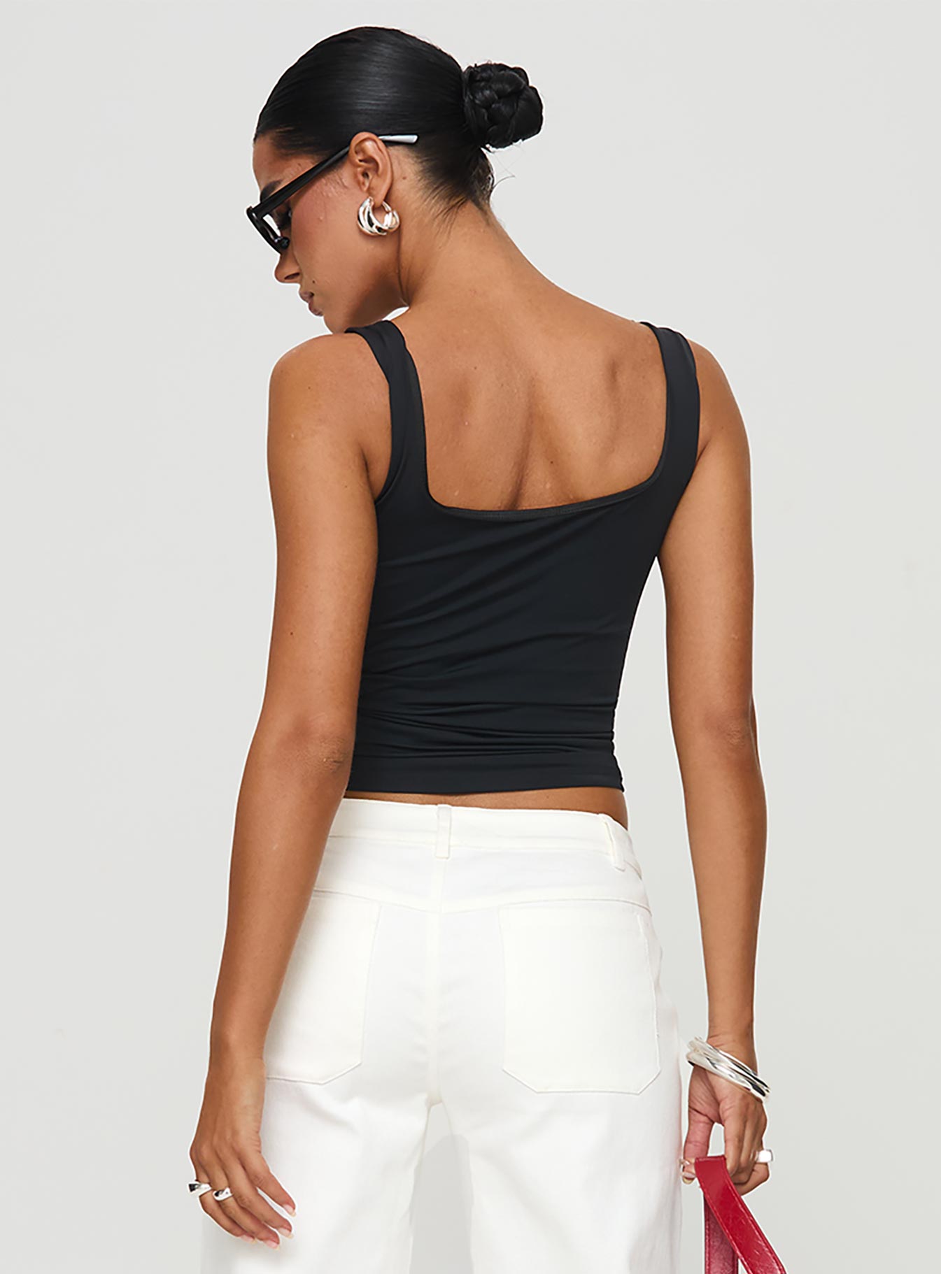 back view of model wearing Princess Polly All My Life Top Black Sleeveless Scoop Neck 