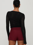 back view of model wearing Princess Polly Sandrine Twist Long Sleeve Top Black Full Sleeves Crew Neck 