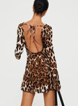Leopard print Mini dress High wide neckline, long slight flared sleeves, curved hem, open low back, back neck tie fastening, invisible zip fastening at back