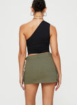 back view of model wearing Princess Polly Take You Cargo Mini Skirt Green Mini Skirts 