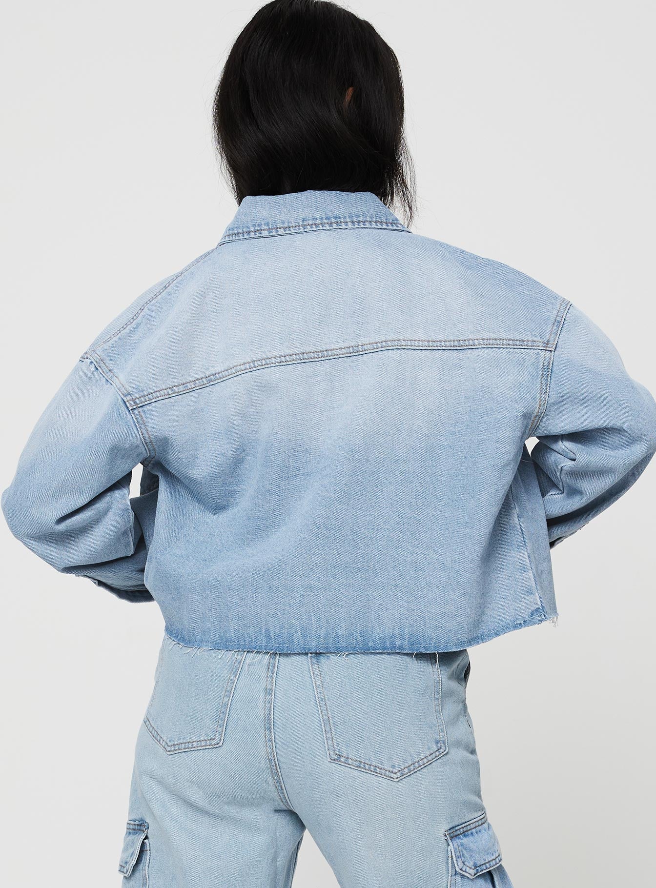 Cropped mid wash denim jacket Classic collar, button fastening at front, twin chest pockets, single button cuff