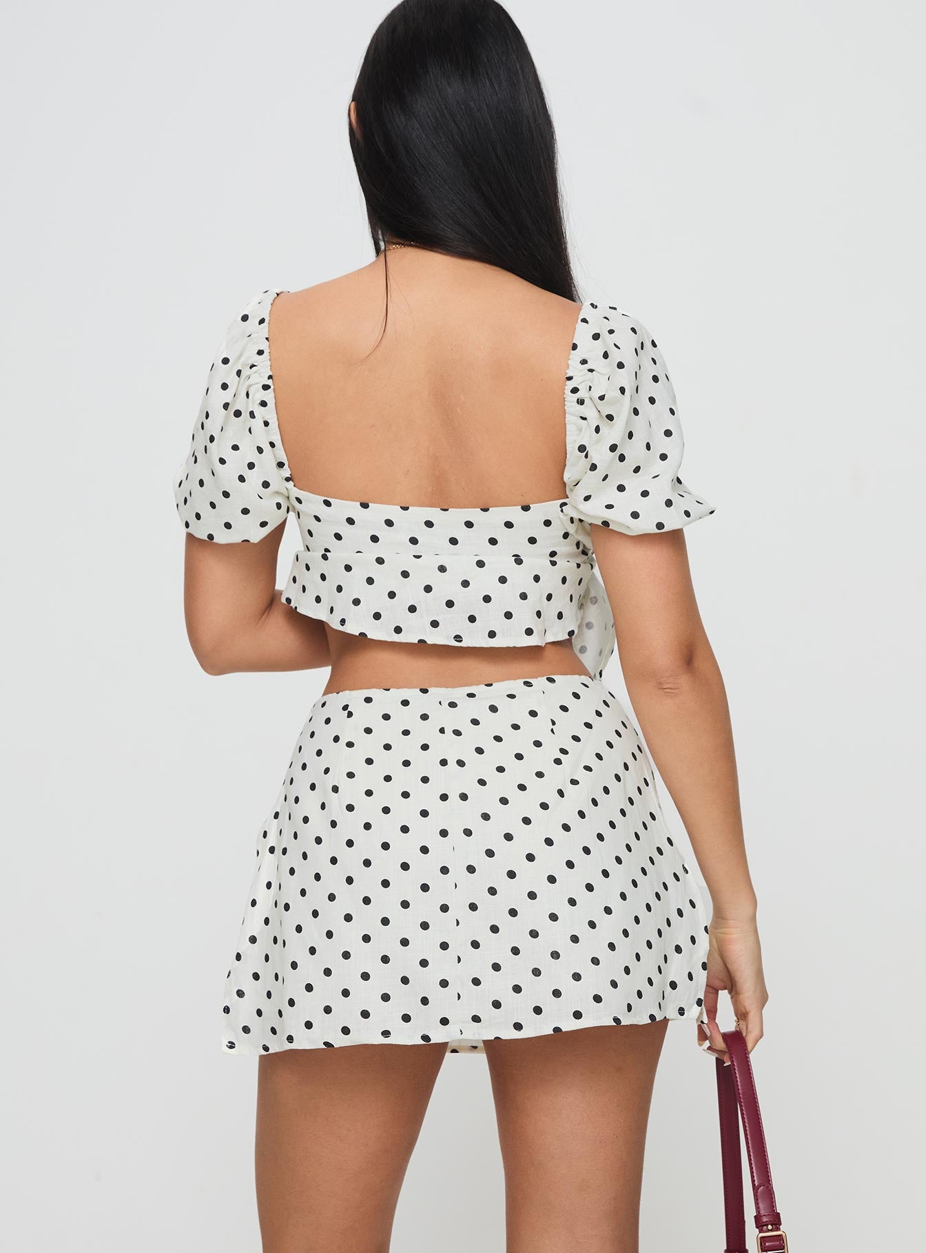 back view of model wearing Princess Polly Adios Linen Blend Skort Cream/Black High Waisted Shorts 