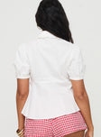 back view of model wearing Princess Polly Tink Top White Short Sleeves V-Neck 