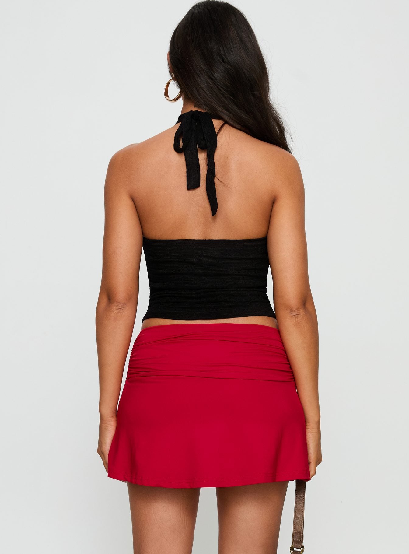back view of model wearing Princess Polly Tamsyn Ruched Mini Skirt Red Mini Skirts 