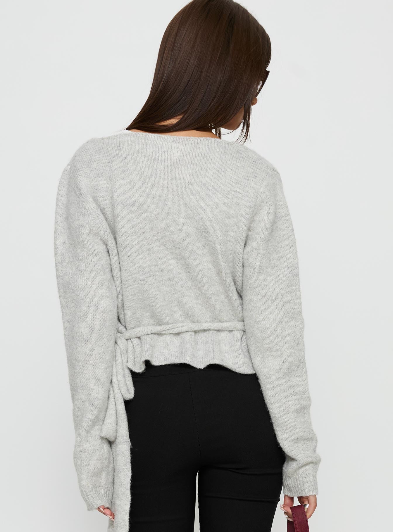 back view of model wearing Princess Polly Tonee Wrap Knit Cardigan Grey Cropped Jumpers 