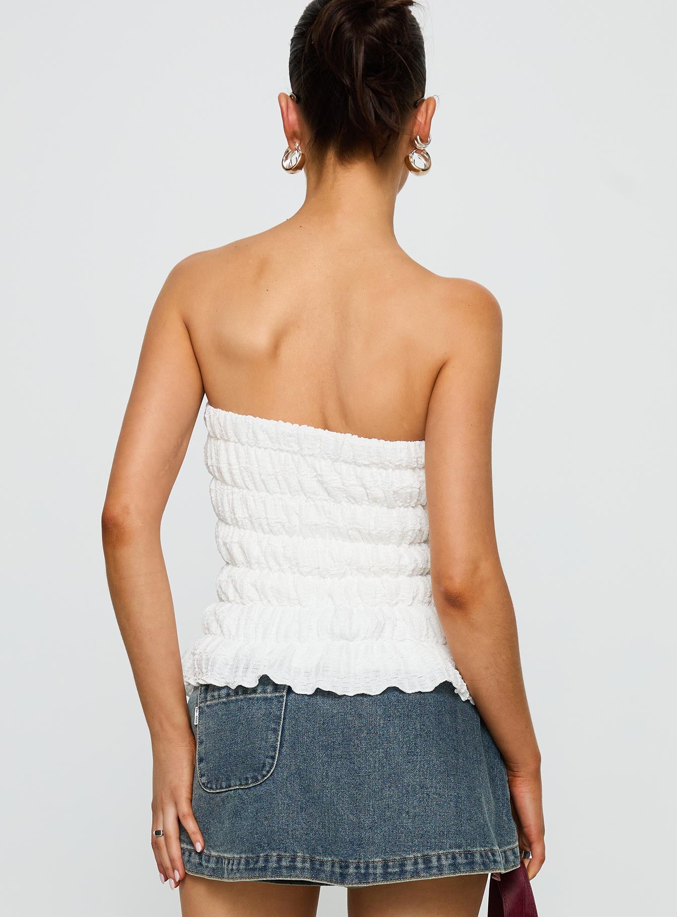 back view of model wearing Princess Polly Flashbloom Strapless Ruched Top White Sleeveless straight 
