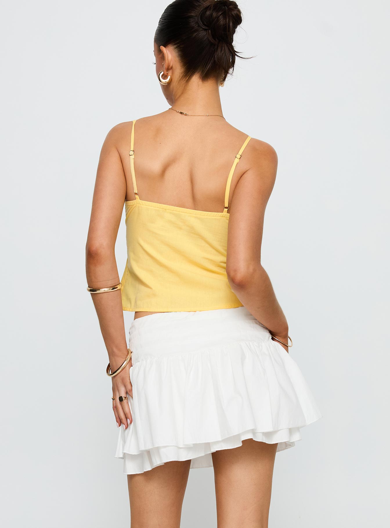 back view of model wearing Princess Polly Honey Honey Top Lemon Sleeveless Plunger 