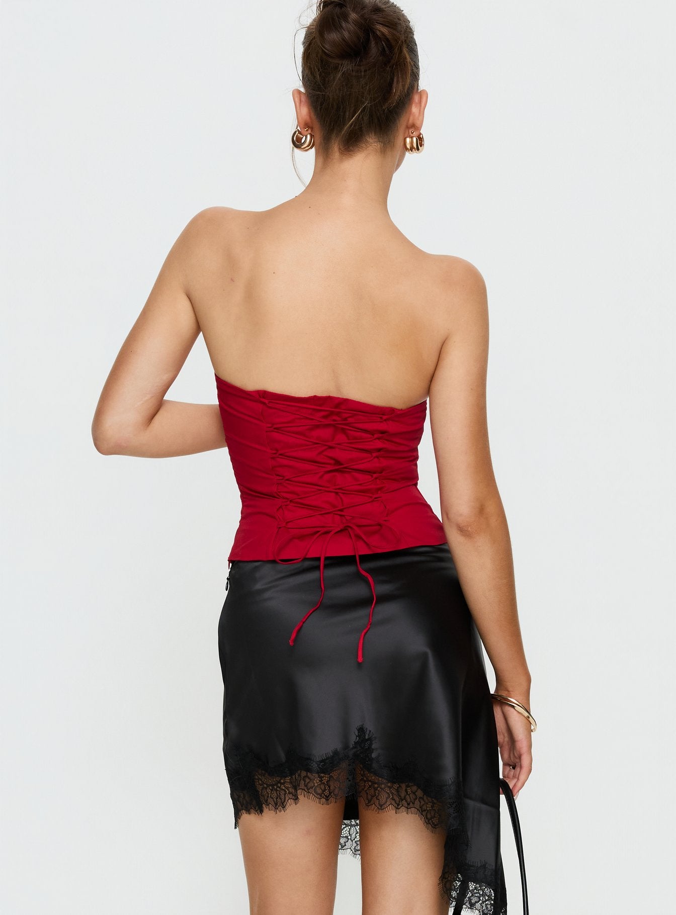 back view of model wearing Princess Polly Idette Lace Asymmetrical Mini Skirt Black Mini Skirts 