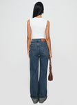 back view of model wearing Princess Polly Florida Keys Cuffed Jeans Mid Blue High Waisted 