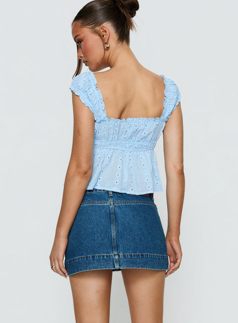 back view of model wearing Princess Polly Warna Low Rise Denim Mini Skirt Mid Blue Wash Mini Skirts 
