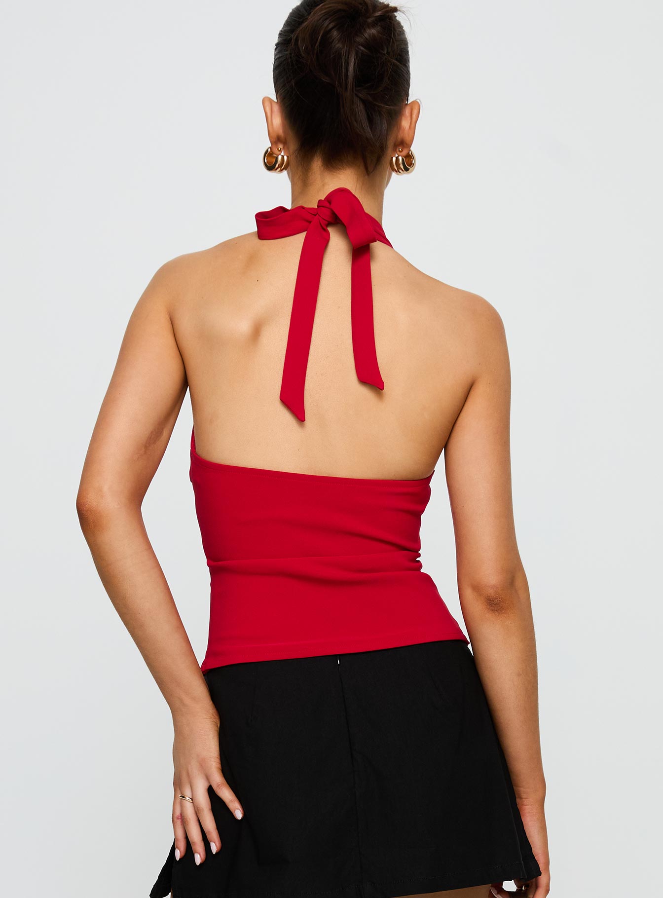 back view of model wearing Princess Polly In Your Life Halter Top Red Sleeveless Plunger 