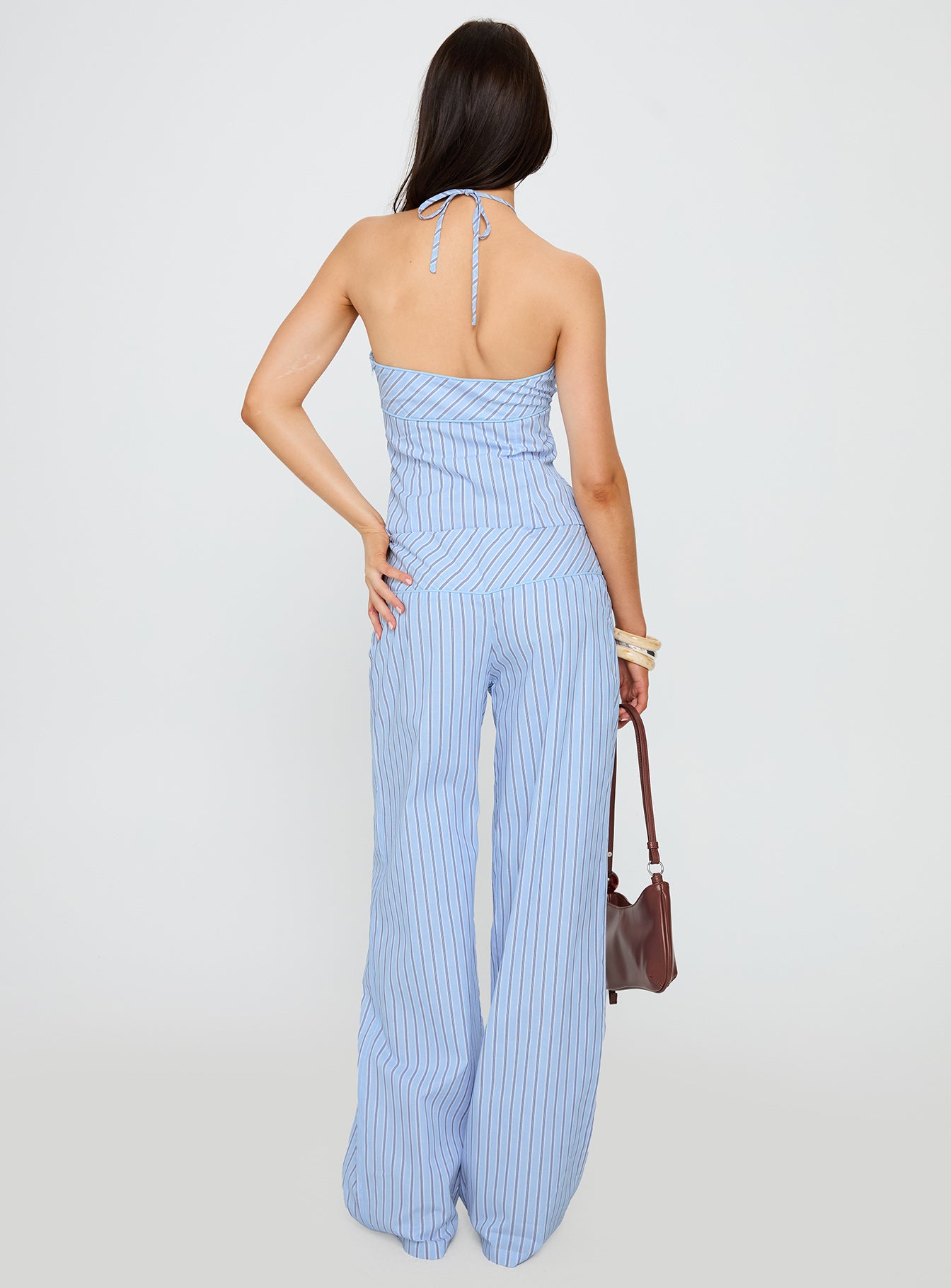 back view of model wearing Princess Polly Sofea Mid Rise Pant Blue Stripe High Waisted Pants 