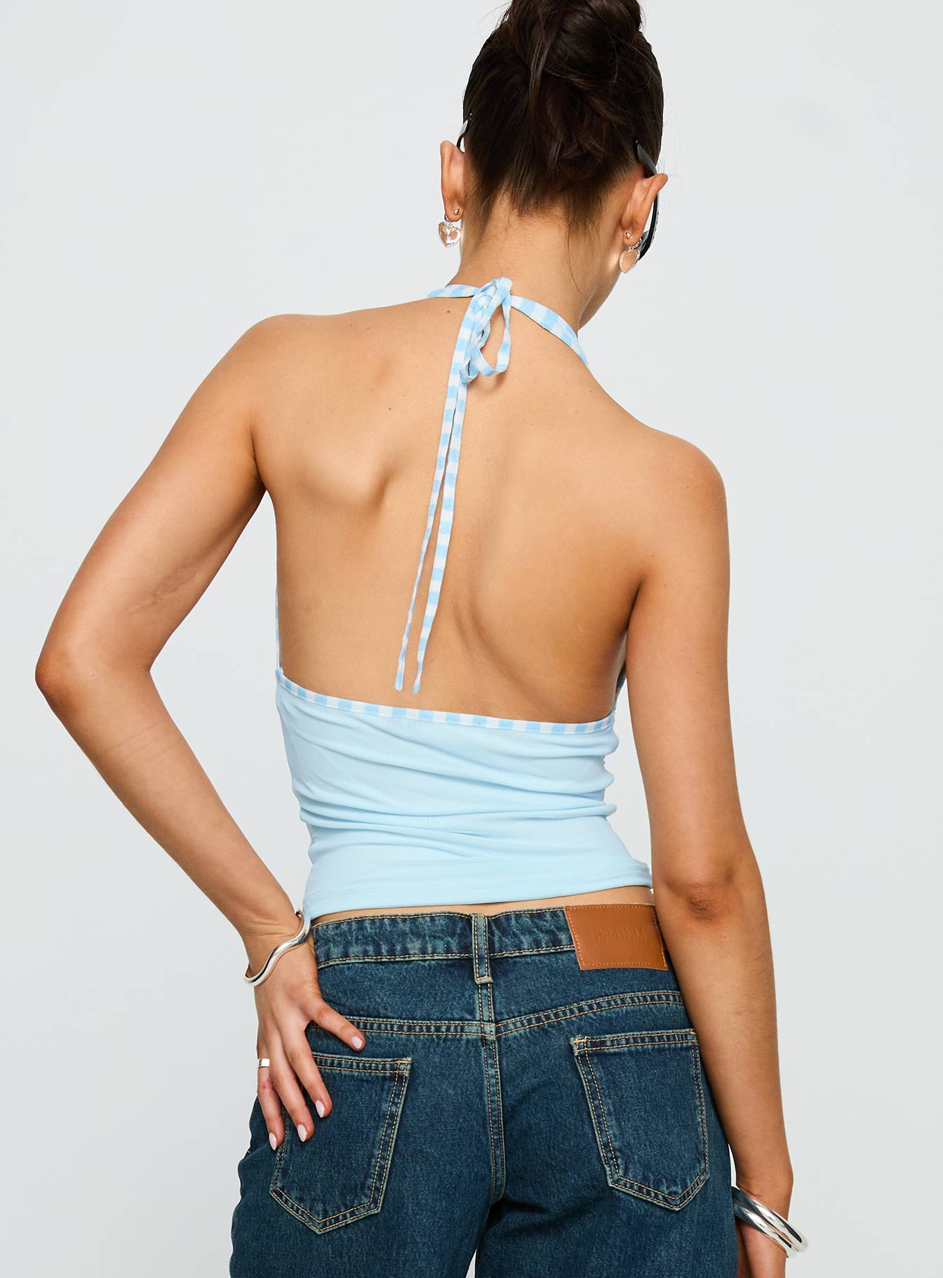 back view of model wearing Princess Polly Mirabelle Top Blue Sleeveless Plunger 