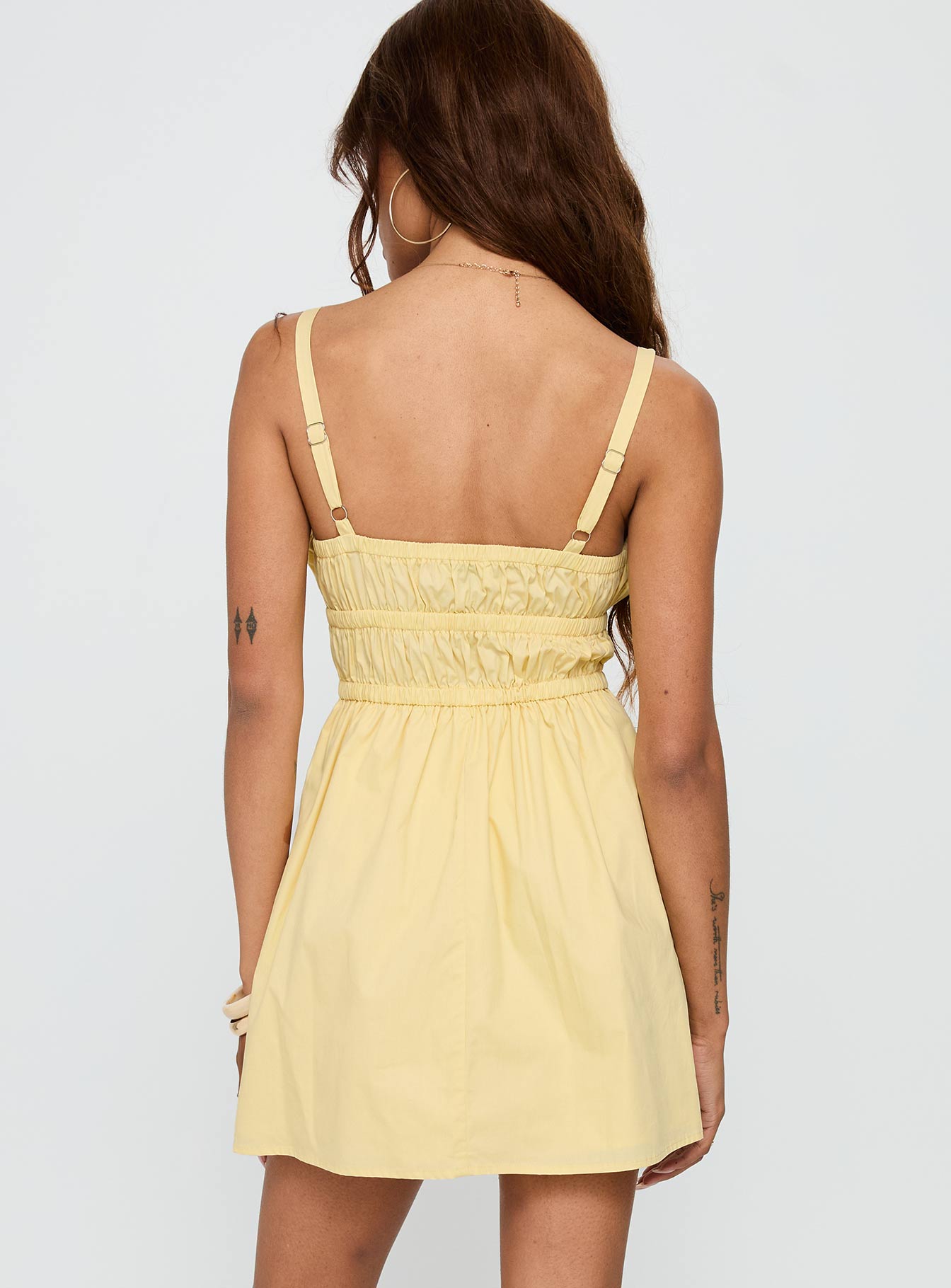 back view of model wearing Princess Polly Viviette Ruched Mini Dress Lemon Plunger 