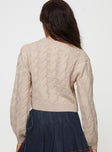 Cropped knot sweater Crew neck, drop shoulder Good stretch, unlined 