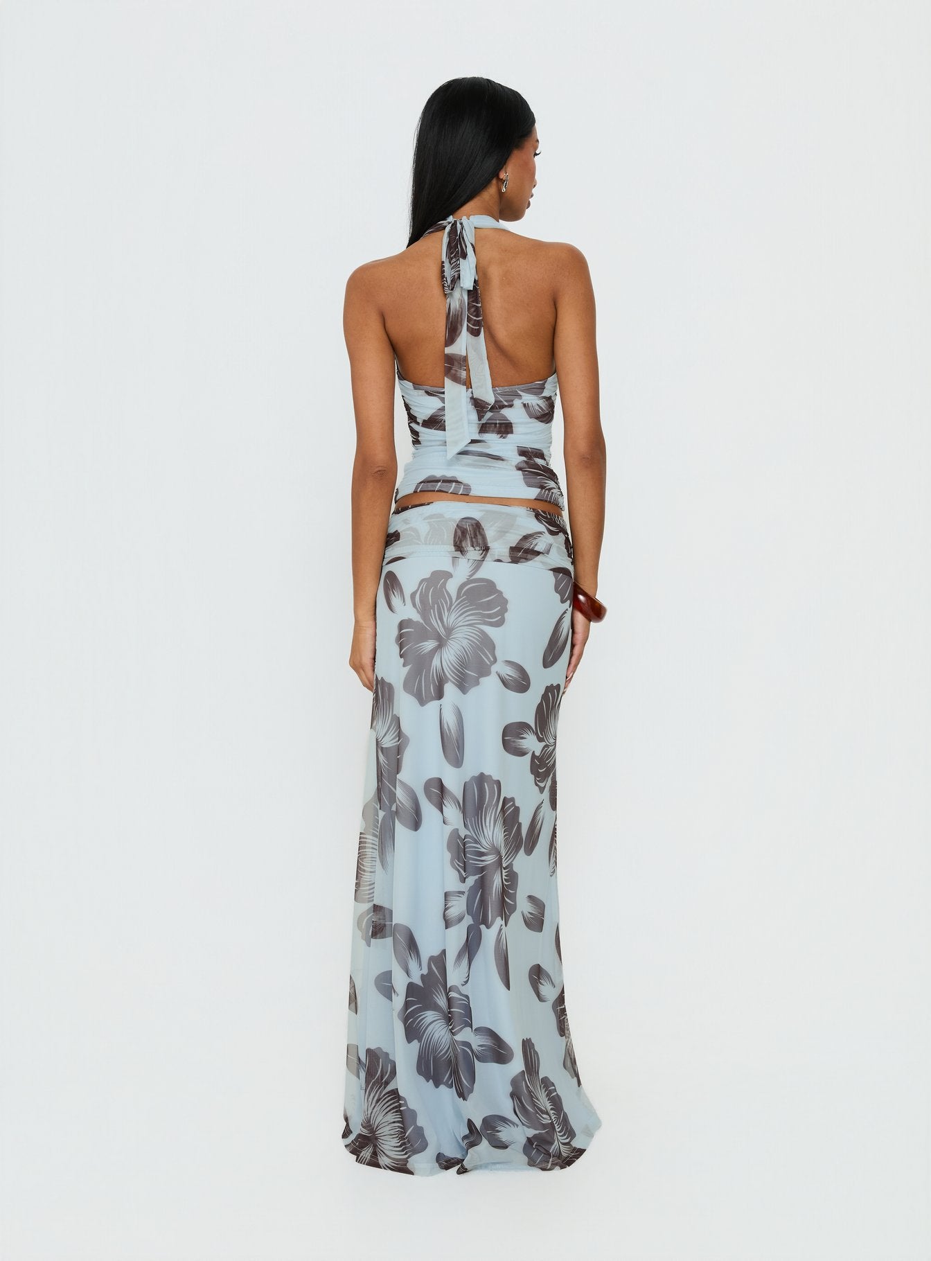 back view of model wearing Princess Polly Roselin Mesh Maxi Skirt Blue Floral 