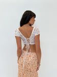 Crop top Sheer lace material Cap sleeve Sweetheart neckline Wired cups Lace up back  Good stretch Lined bust