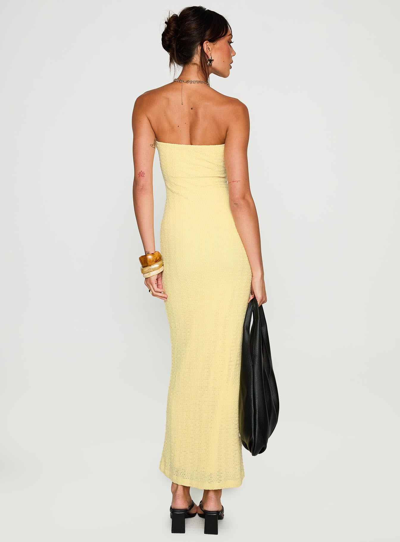 back view of model wearing Princess Polly Saijana Strapless Maxi Dress Lemon Straight Neck 