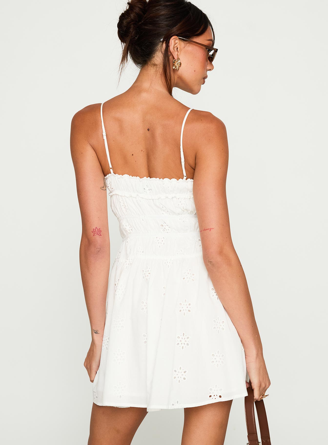 back view of model wearing Princess Polly Wish Me Luck Shirred Mini Dress White Sweetheart Neckline 