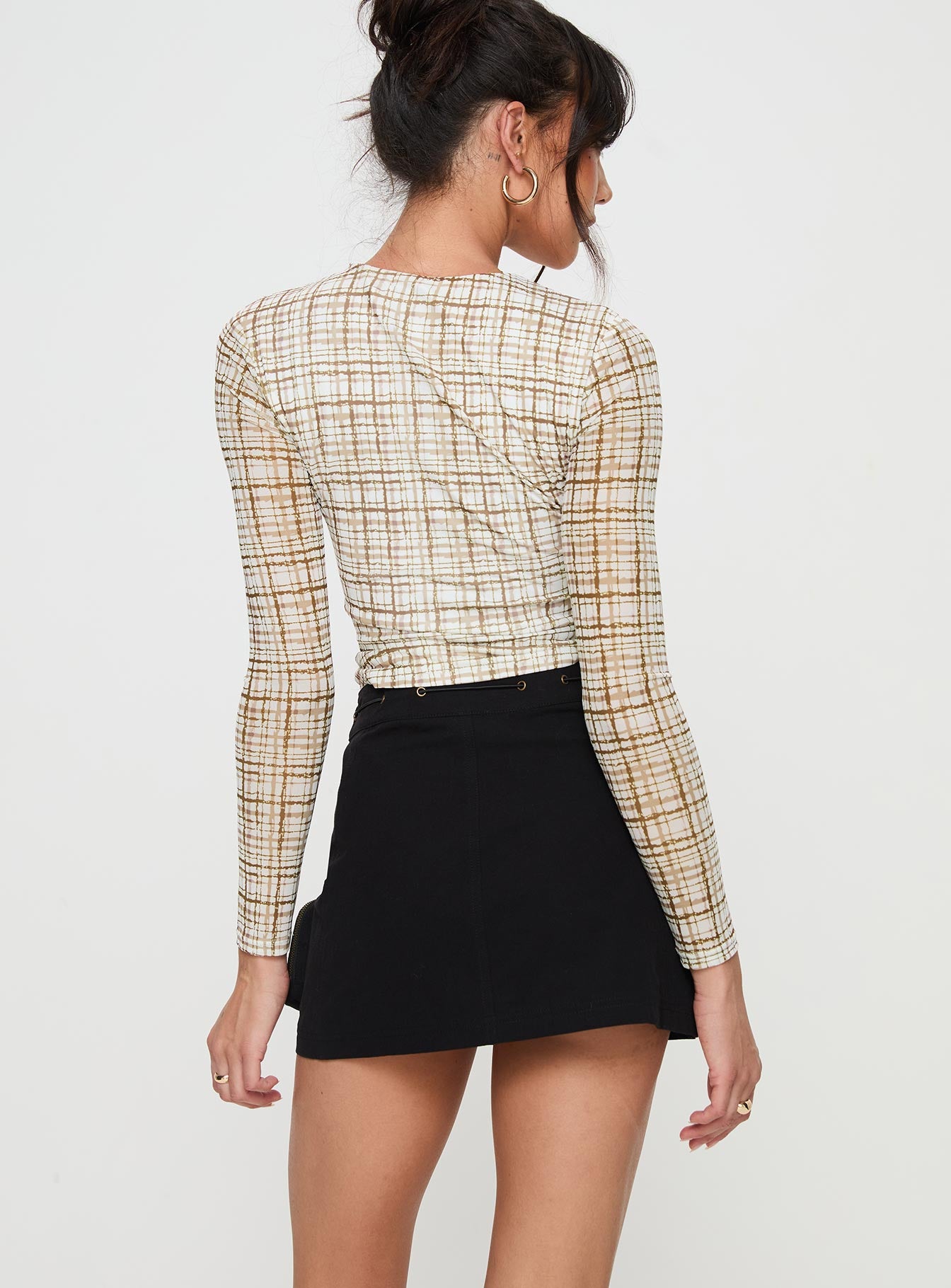 back view of model wearing Princess Polly Rolleston Cargo Mini Skirt Black Mini Skirts 