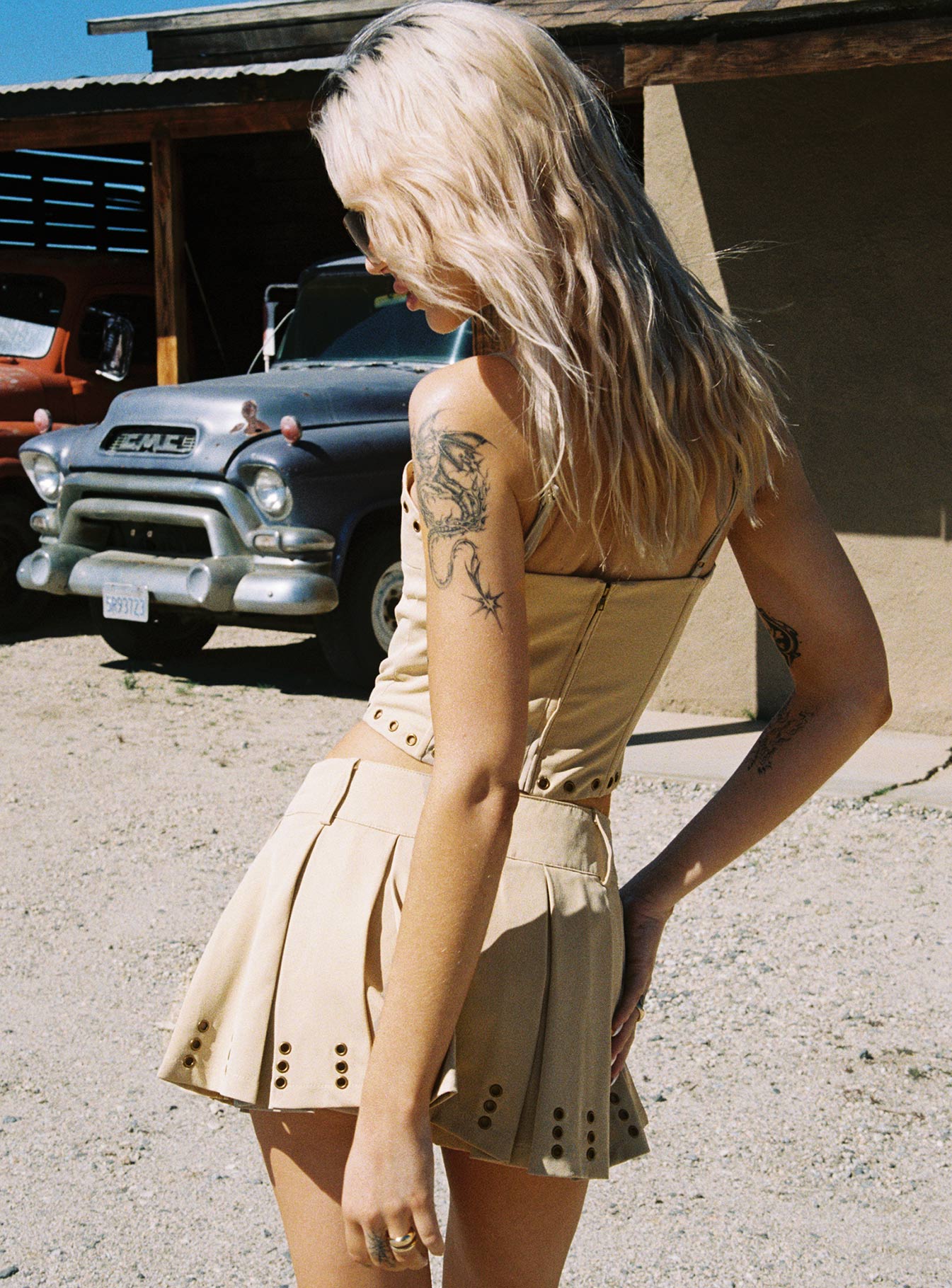 back view of model wearing Princess Polly Alinzia Eyelet Corset Top Beige Sleeveless Sweetheart 