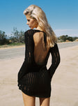 Black Knit material, high neckline, distressed detail, open back with tie fastening