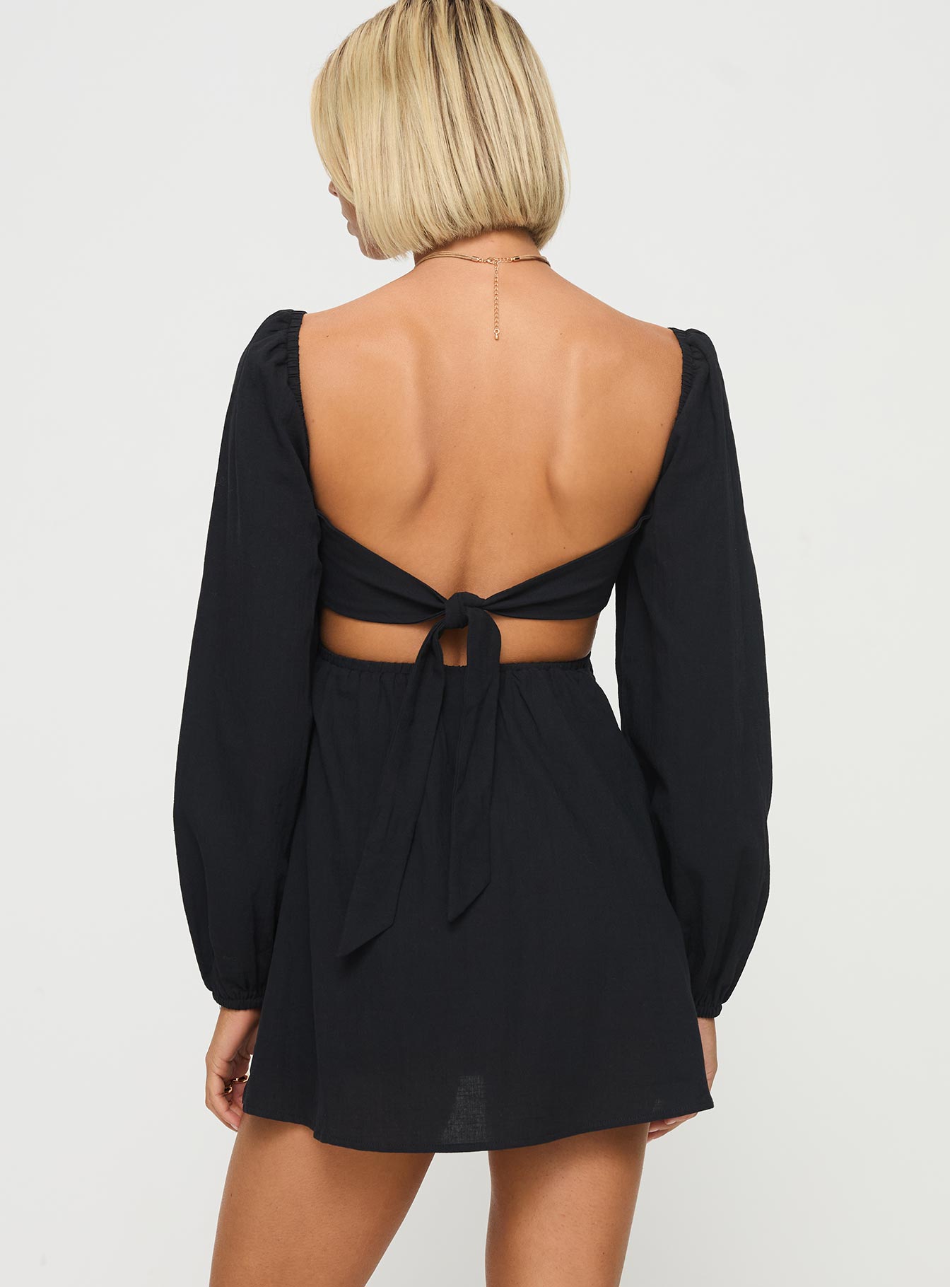 back view of model wearing Princess Polly Summer Nights Long Sleeve Mini Dress Black Square Neck 