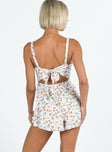 Romper Floral print Ruffle detailing Open back with tie Invisible zip at back Elasticated backband Fixed straps Fully lined