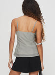 back view of model wearing Princess Polly Me Espresso Top Black / Beige Sleeveless Plunger 