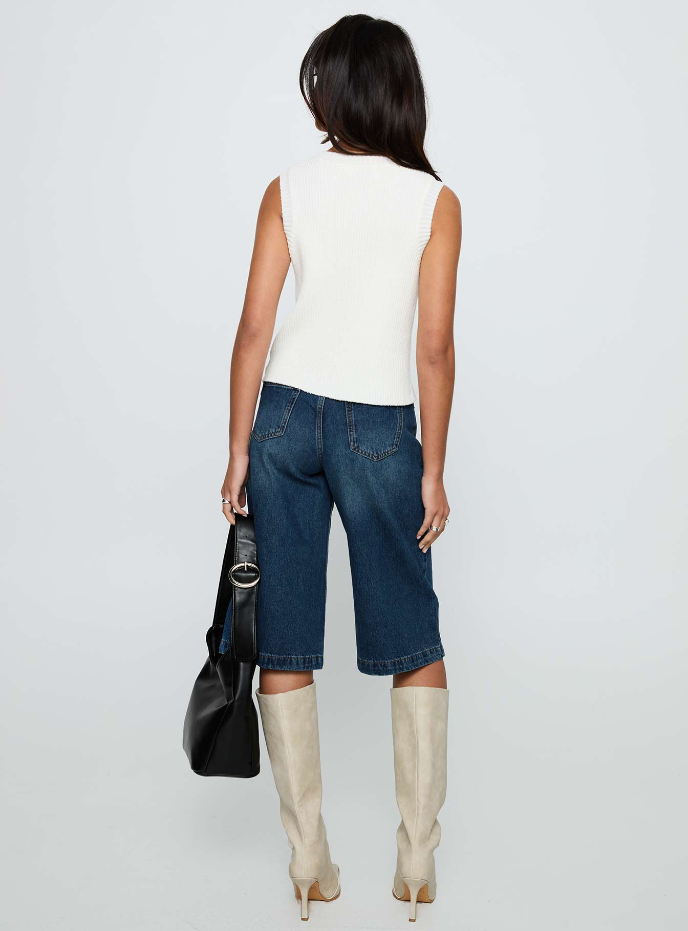 back view of model wearing Princess Polly Ollison Longline Denim Shorts Blue High Waisted Shorts 