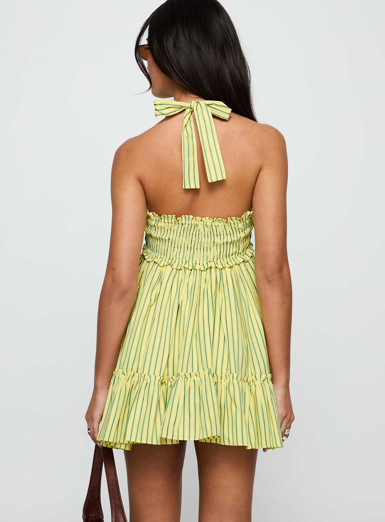 back view of model wearing Princess Polly Tiptoe Mini Dress Yellow Stripe Square Neck 