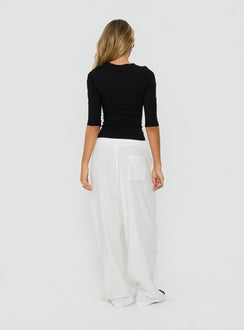 Introducing Mankind Baggy Cargo Pants White in womens-regular-pants with mid-rise, back view of model wearing Princess Polly