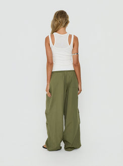Style the Mankind Baggy Cargo Pants Olive in womens-regular-pants featuring mid-rise waist back view of model wearing Princess Polly