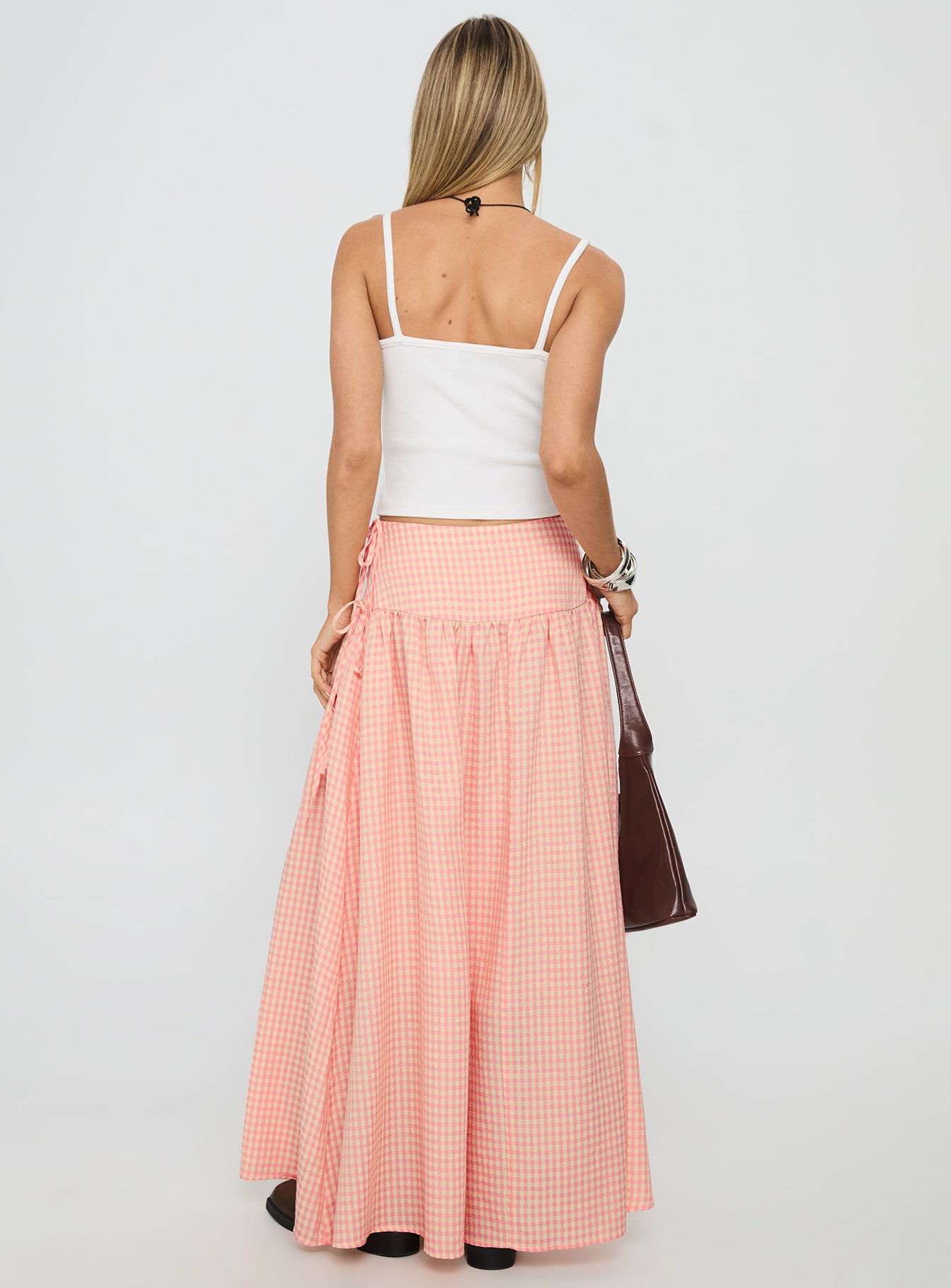 back view of model wearing Princess Polly Analeah Tie Side Midi Skirt Orange Check Maxi 