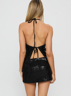 back view of model wearing Princess Polly Zelaia Shimmer Mini Skirt Black Mini Skirts 