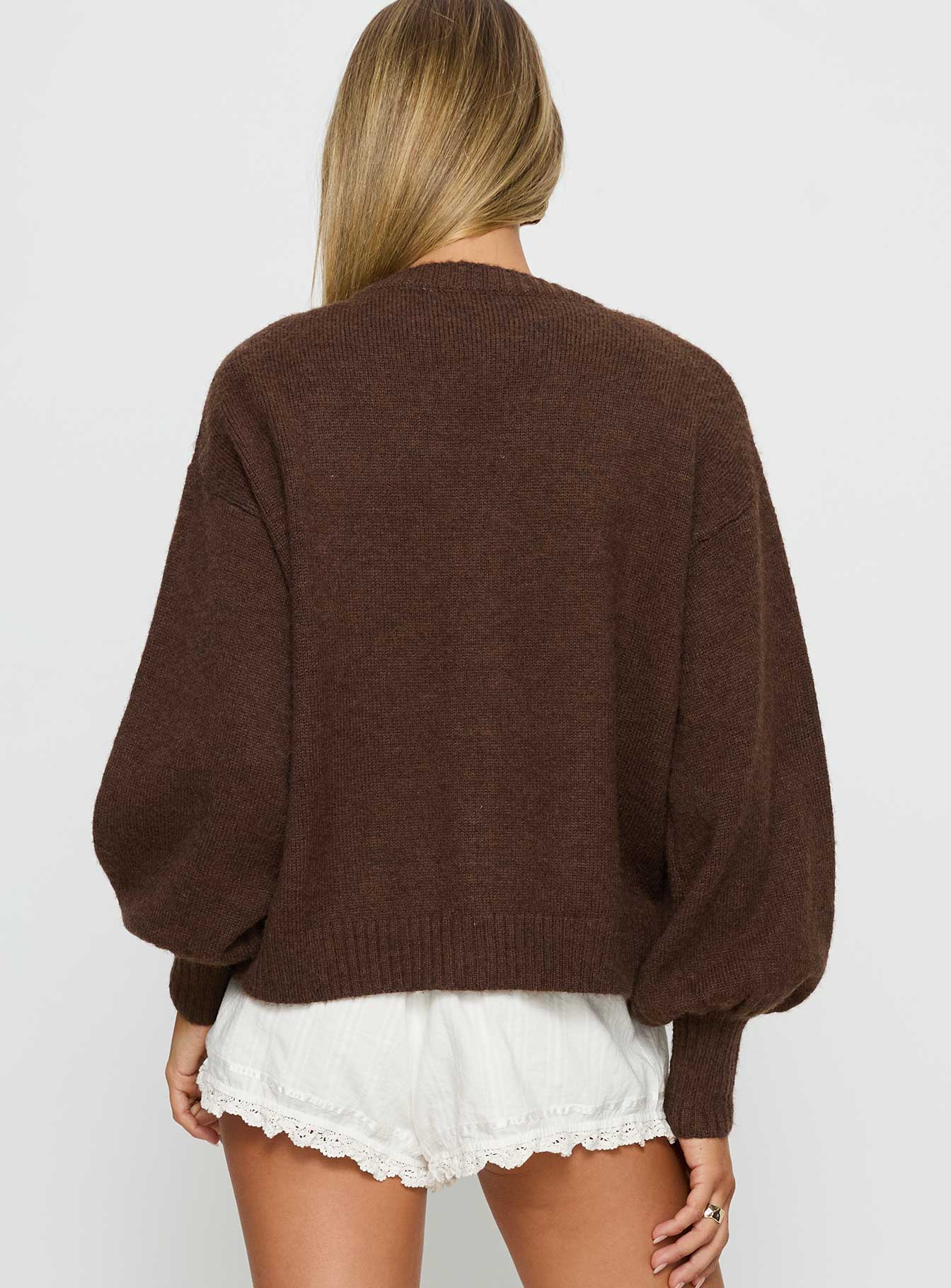 back view of model wearing Princess Polly Eartha V Neck Knit Sweater Brown Long 