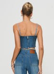Denim top Adjustable straps, corset style, inner silicone strip at bust, zip fastening Non-stretch material, unlined 