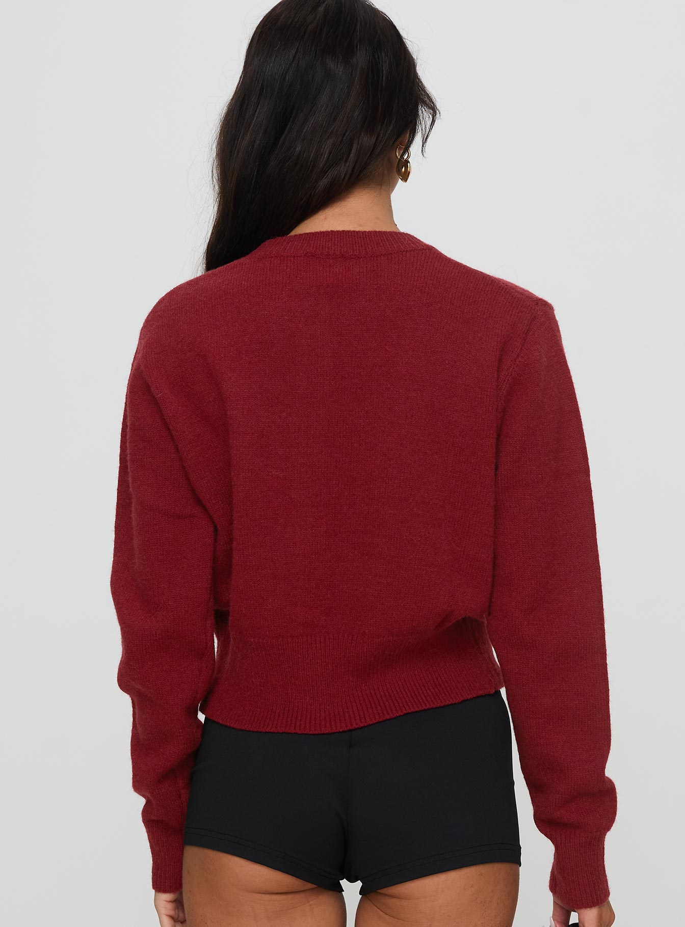 back view of model wearing Princess Polly With A Bow Cardigan Red 