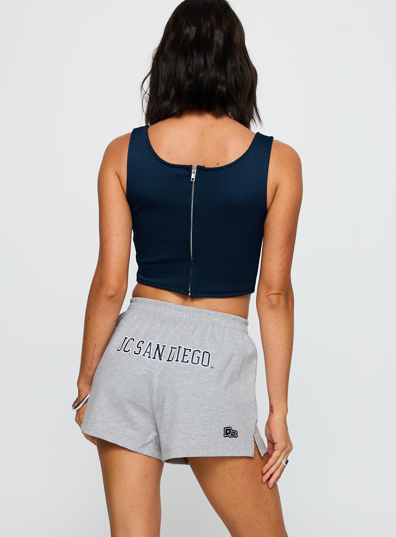 back view of model wearing Princess Polly UC San Diego Soffee Short Heather Grey High Waisted Shorts 