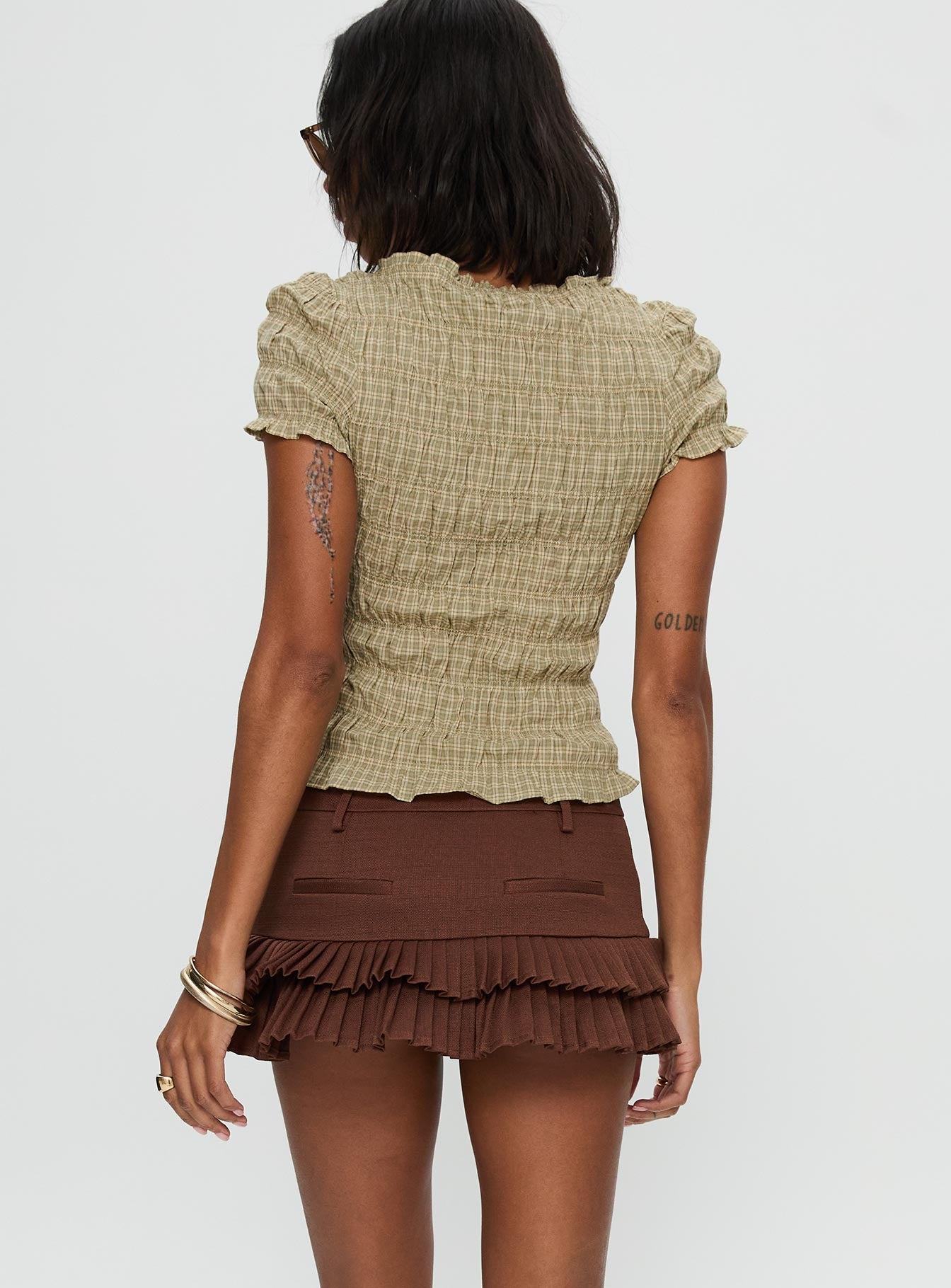 back view of model wearing Princess Polly Deei Double Ruffle Mini Skort Chocolate Low Rise Shorts 