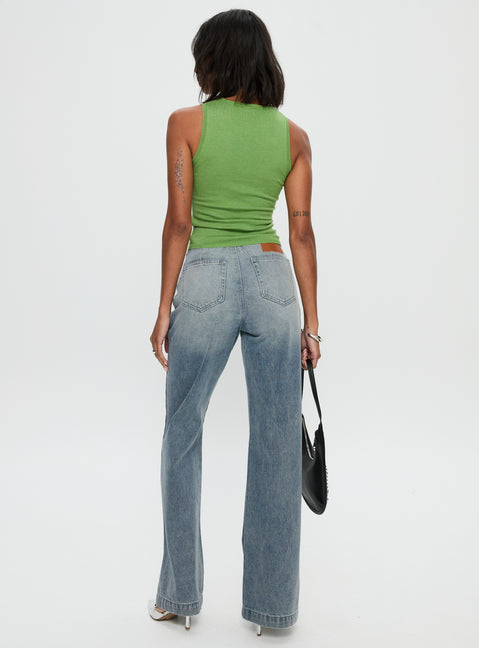 back view of model wearing Princess Polly Slow Ride Belted Jeans Light Blue Mid Rise 