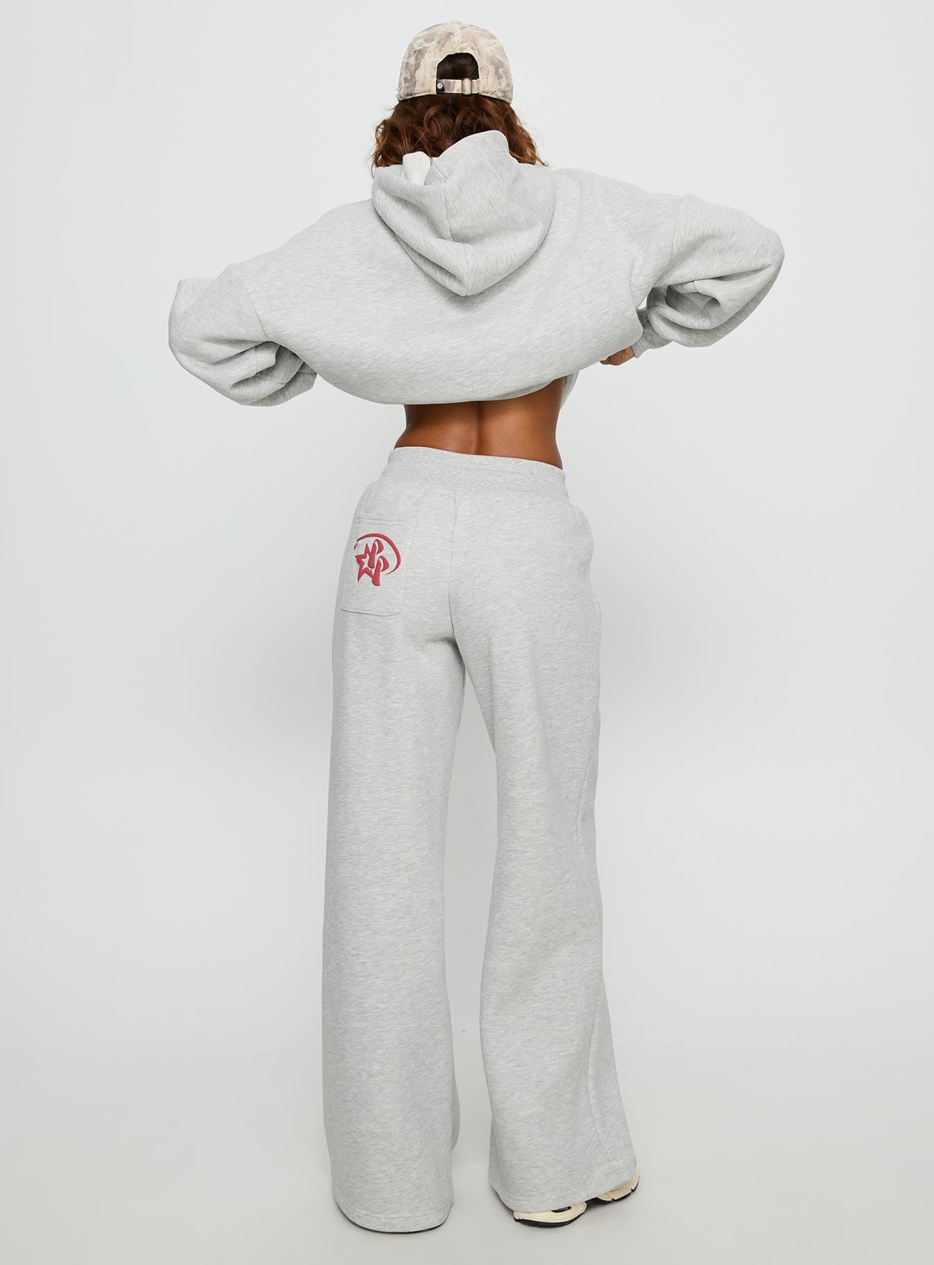 back view of model wearing Princess Polly Princess Polly Stargirl Wide Leg Sweat Pants Grey Marle High Rise Pants 