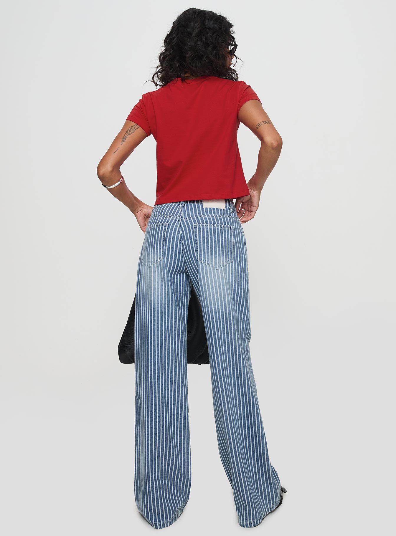 back view of model wearing Princess Polly Blaise Jeans Blue Stripe Mid Rise 