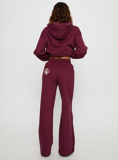 back view of model wearing Princess Polly Princess Polly Stargirl Wide Leg Sweat Pants Burgundy High Rise Pants 