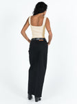 Denim maxi skirt High rise Black denim Belt looped waist Zip and button fastening Three pocket design Front slit